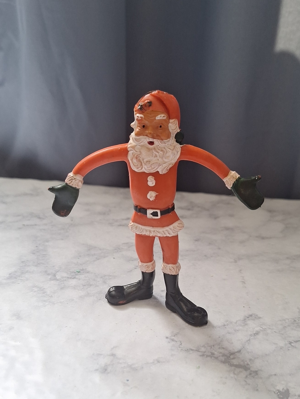 Vintage-inspired Santa Figurine with Green Mittens And Black Boots